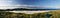 Beach panorama with tent in foreground