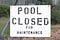 Sign: “Pool Closed for Maintenance”