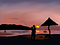 diving couple-sunset by the beach