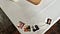 Cards that adorned the tables at Rockwood's 15th anniversary party in 2015. Images include an old photo of president Akaya Windwood and co-founder Andre Carothers, as well as staff member Sharon Price with a goat at a staff retreat, and shots of our retreat spaces.
