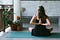 Women doing reverse prayer yoga pose
