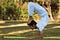 Indian good looking, strong man doing extreme yoga asana