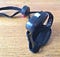 The Petzl e+LITE has a built-in swizel stand in addition to a head strap and emergency whistle