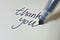 Thank you written on a piece of paper
