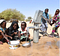 Children filling their bowls with water. Picture from the United Nation’s Instagram page.