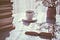 old books and coffee on the table