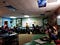 Students circled around the edges of a classroom