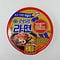 An unopened cup of Samyang Ramen Gold in a top-down photo.