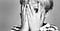Image of boy covering his eyes with his hands in fear.