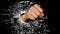 A fist punching through glass.