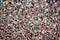 Aerial shot of a densely packed audience of standing people taking up the entire frame.
