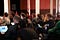 Attendees of the October 2019 DecidimFest conference gather in seats.