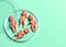 Baby figures in petri dish to symbolize IVF.