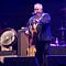 Photograph of musican John Prine Time in concert.