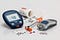 A gluco-meter, syringe and Sugar strips for measuring blood sugar level for diabetes
