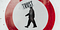 A pedestrian walking sign with a trust sticker on it