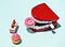 Pastries, a donut and a set of plastic teeth