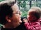 A photo of the author holding his baby daughter.