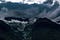 Mountain range covered by storm clouds