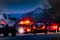 Blurred image of emergency vehicles stopped at crash