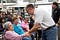 Greg Siekaniec gives a warm handshake to 90 year old internment survivor Haretina Krukoff