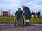 Wheelchair bound tourist viewing from behind other tourists