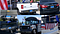 A collage of eight cars, trucks, and buses with obscured or missing license plates