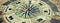 An ancient compass made of painted floor tiles