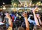 Disney World parkgoers wave goodbye to the theme park in March 2020.
