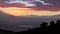Digital landscape painting of a sunset. It shows the sun going down over Palestine as seen from as-Salt, Jordan.