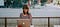 Young lady working outside on laptop
