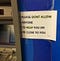 sign at an ATM