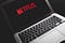 laptop computer showing Netflix screen