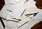 Dozens of blank envelopes scattered on the floor