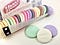 An open sleeve of Necco Wafers a rainbow disk candy