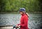 woman fishing on a dock