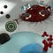 A digital illustration of a nanoparticle delivering mRNA to a T Cell.