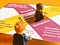 Returning to original idea of one minifig inside space in centre of postcard & other outside, holding the postcard