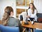 An individual speaking with a therapist.