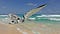Image of sailboat stuck on sand