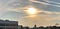 The sky above Spokane, showing the faded sun behind clouds.
