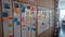 White boards with photos of each Cogapper on and post-it notes containing tasks