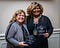 Cheri Coryea and Simone Peterson pose with their awards from the 2019 Manatee Young Professional MVP Awards.