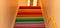 Multicoloured staircase from below