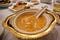 think yellow soup on banquet table