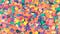 A pile of multi-colored paper confetti circles.