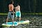Two paddle boarders in Aspen. Photo by Nic Daughtry