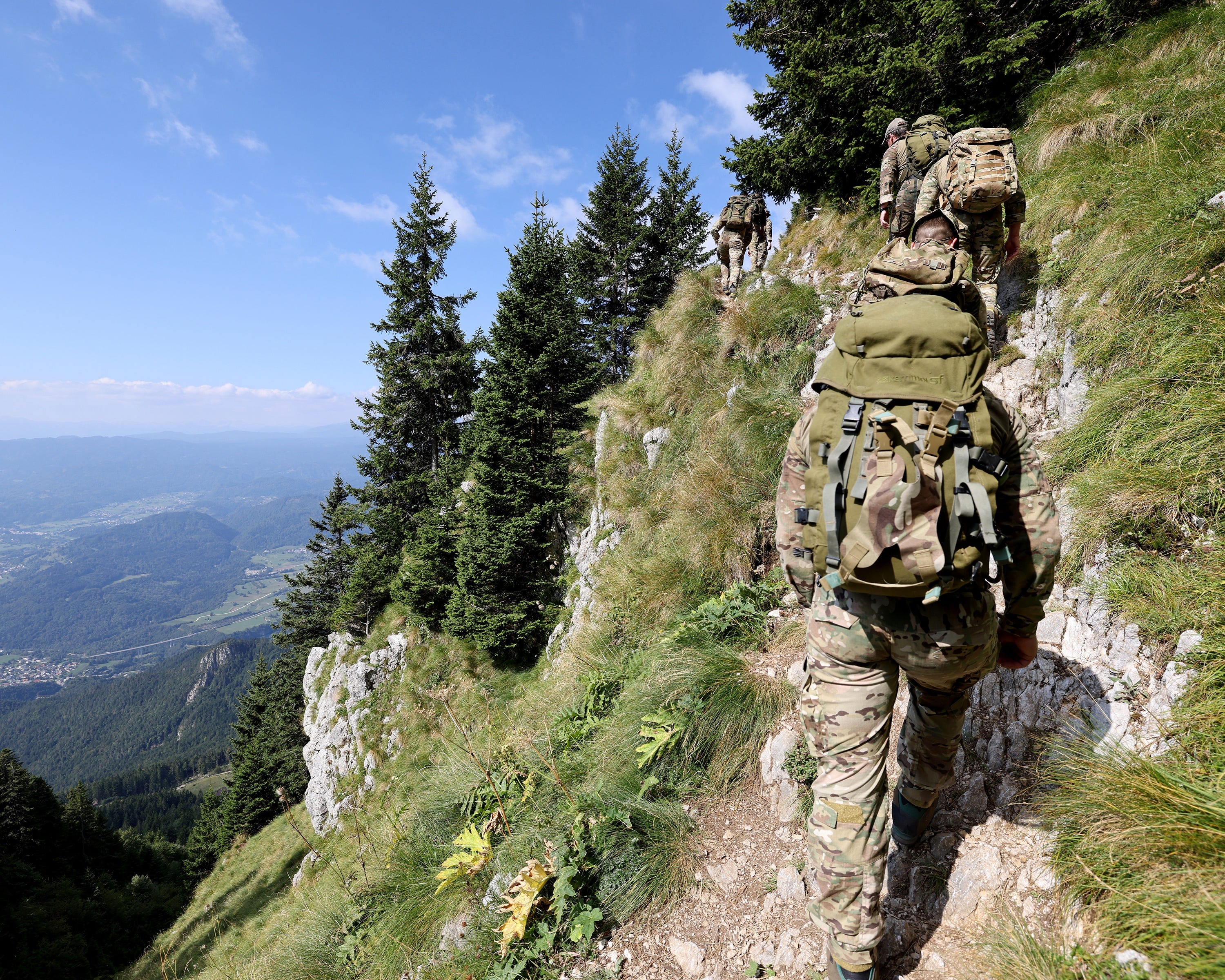 Royal Marines from Yankee Company on a mountain march in the Slovenian mountains.