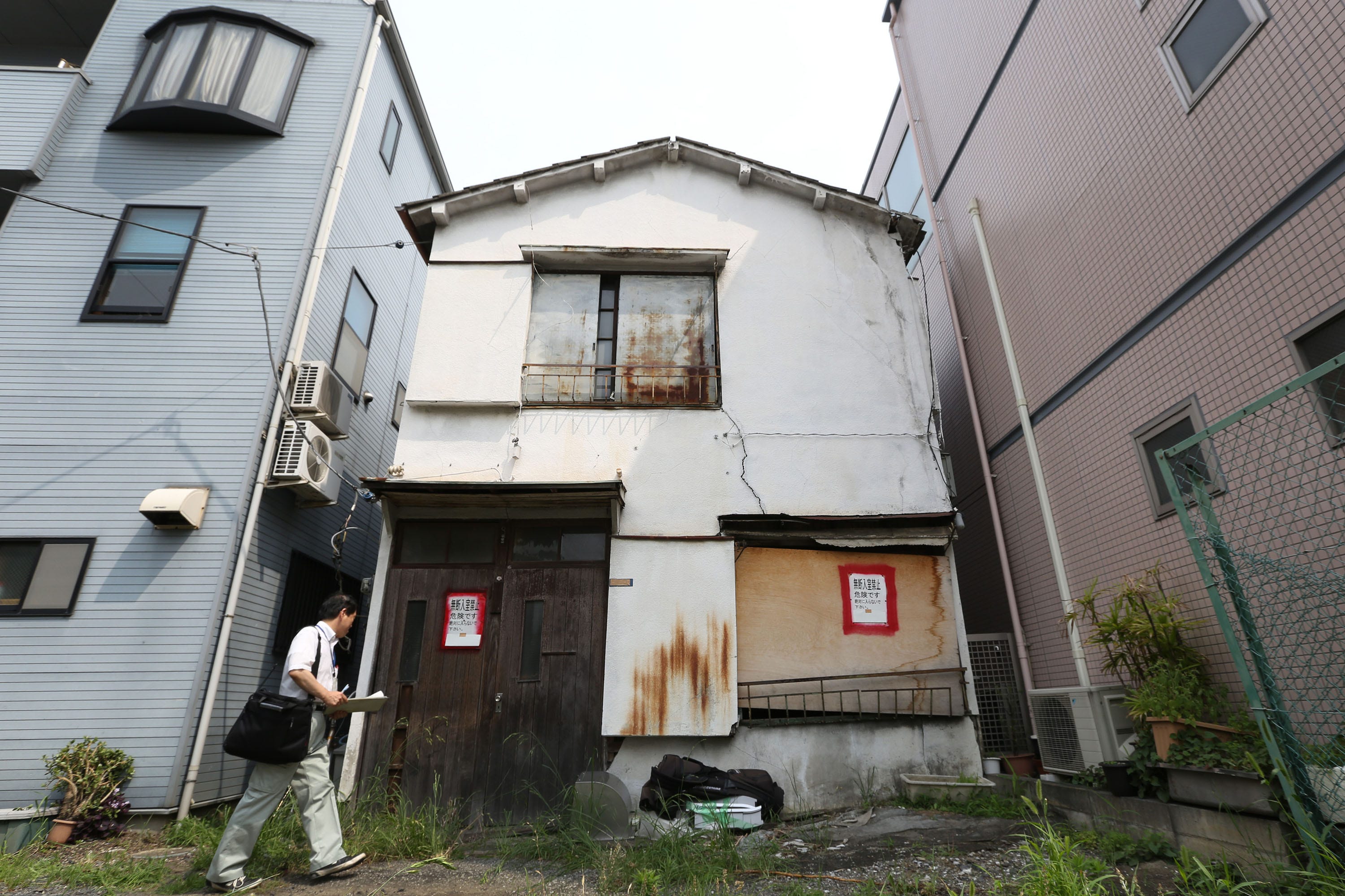 how can i buy an abandoned house