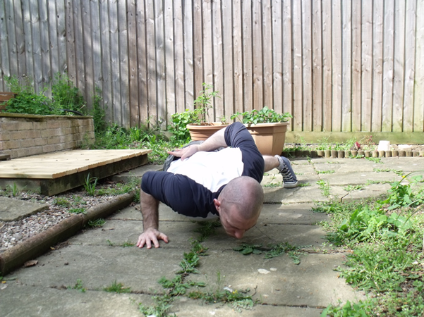The One Arm Push Up. Along with the one arm pull up, a… | by Simon Boulter  | Medium